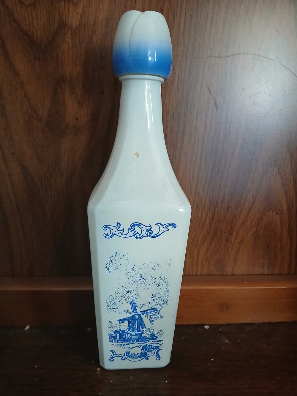 White Ceramic Bottle with Blue Windmill Design